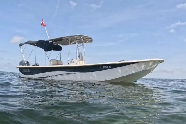 Carolina Skiff tour boat underway on open water.